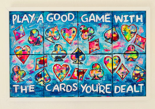Eight-panel abstract canvas set titled “Play a Good Game,” featuring bold colorful brushstrokes mixed with oversized playing card suit symbols, conveying resilience and motivation.
